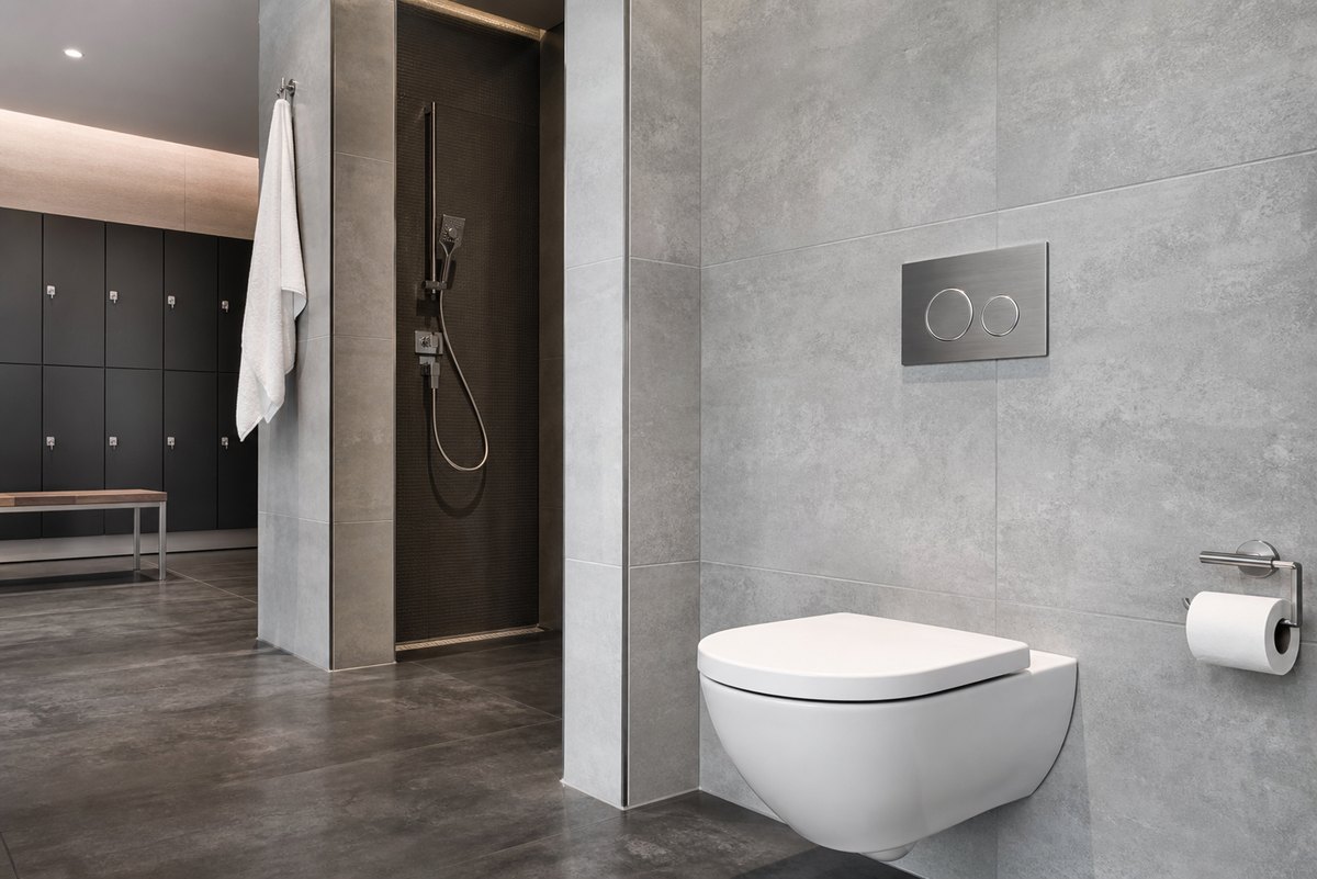 wall hung toilet solution for fitness center bathrooms